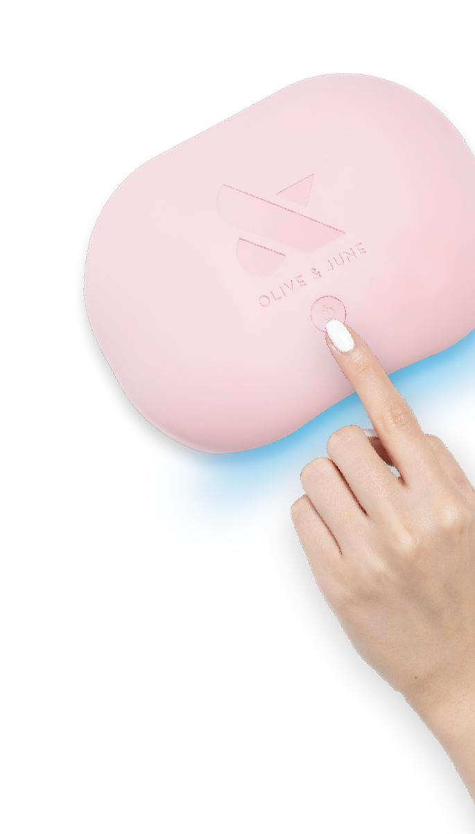 hand pressing button on uv lamp